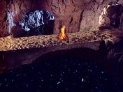 the Mirror Pool Below, with a fire burning next to it