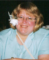 with a flower in her hair